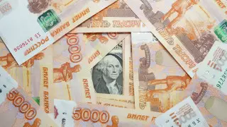 Нацбанк установил официальные курсы доллара и рубля на 22 сентября