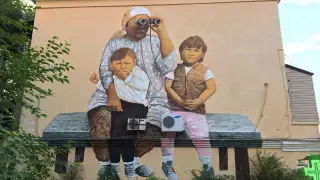 "Мог простоять еще 50 лет". В Алматы закрасили знаменитый мурал с апашкой