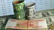 Названы официальные курсы доллара и рубля на 9 ноября