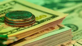 Курс доллара упал почти на 7 тенге