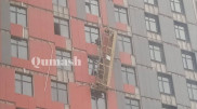 Рабочие выпали из люльки с высоты 14-го этажа в Астане