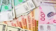 Названы официальные курсы доллара и рубля на 23 декабря