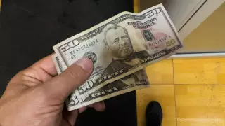 Курс доллара еще немного снизился