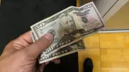 Курс доллара еще немного снизился