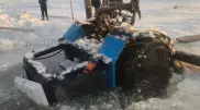 Затонувший трактор подняли со дна Бухтарминского водохранилища