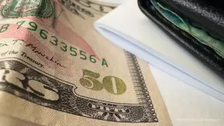 Курс доллара еще немного снизился