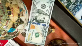 Курс доллара начал неделю с роста