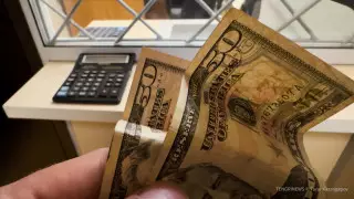 Курс доллара упал еще на 3,5 тенге