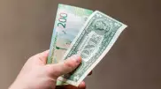 Названы официальные курсы доллара, рубля и евро до 9 марта