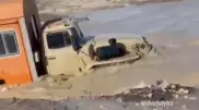 Паводки в Казахстане: Грузовик с людьми чуть не унесло бурным течением