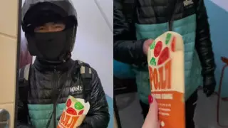 Добрый тренд: алматинка накормила попавшего под дождь курьера