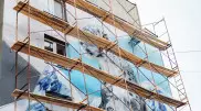 Как восстанавливают уничтоженный мурал с барсом в Алматы: фото