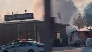 Автомобиль вспыхнул возле цирка в Астане