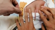 Уникальный ребенок с 10-сантиметровым хвостом родился в Китае