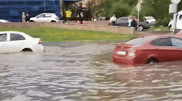 Астана "плывет" после мощного ливня: видео