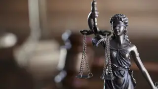 Осужденный за мошенничество оправдан в Казахстане