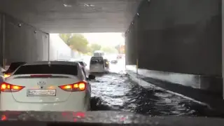 Проезд затопило ливнем в Алматы