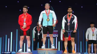 Поднял 388 килограммов: казахстанский тяжелоатлет стал новым чемпионом мира