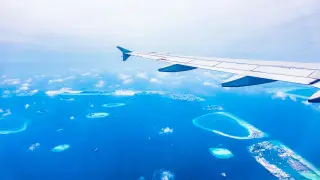 Пассажирка попыталась открыть дверь самолета над Индийским океаном