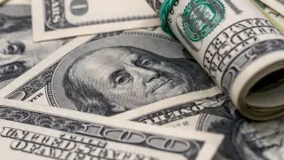 Курс доллара снова опустился ниже 515 тенге