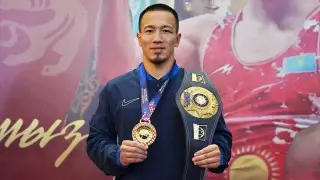 Оркестр и объятия. Чемпиона мира Айдоса Султангали встретили в Астане