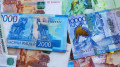 Рубль дорожает, но теряет доверие в Казахстане