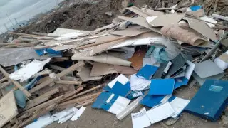 Архивные папки с данными пациентов нашли среди мусора в Атырау