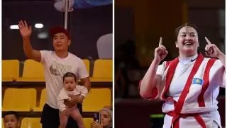 С ребенком на руках: тренер по борьбе растрогал казахстанцев