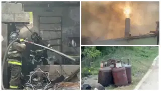 Девять газовых баллонов вынесли спасатели из горящего дома в Астане