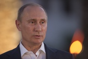 Putin tours Russia flood scene, berates officials 