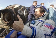 Woman takes command of ISS after crew return 