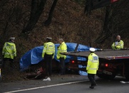 China suspends officials after 11 kids die in road wreck 