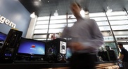 Personal computer sales slip during holiday season 