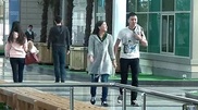 Astana students hold hands