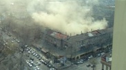 Two-storey building on fire next to Stolichyi in Almaty
