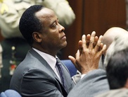 Jackson death doctor had huge debts, trial hears 