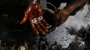 Oil flowing from abandoned well in Atyrau oblast
