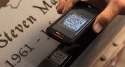 High-tech tombstones let loved ones live on, virtually 