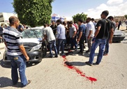 Clashes erupt in Tripoli, bomb kills Libya army officer 