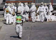 Fukushima workers evacuated as small tsunami hits Japan