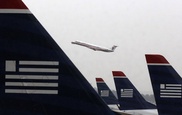 US still in talks with US Airways, American on merger