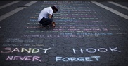One year on, Newtown voices revive pain of massacre