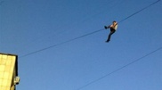Rescuers get drunk man down from wires in Ust-Kamenogorsk