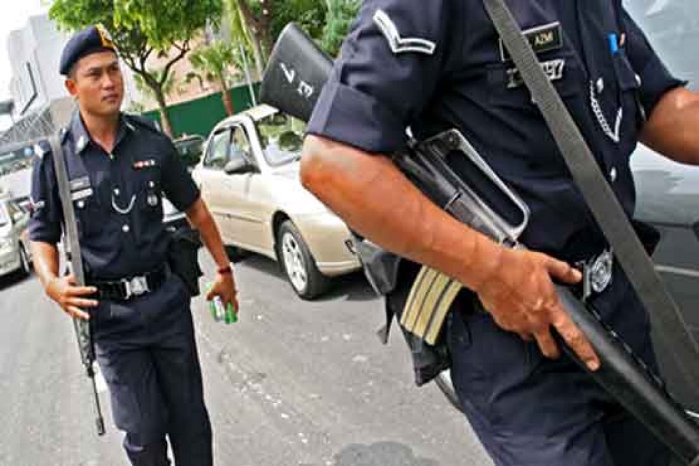 Malaysian police arrest 13 over gang-rape of teen