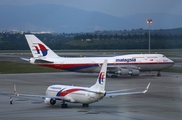 Flight MH370 families get $50,000 in first payouts