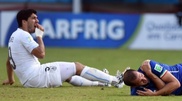 Football: Suarez risks World Cup ban after Italy bite