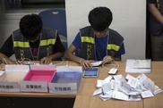 China slams Hong Kong democracy poll despite 800,000 votes