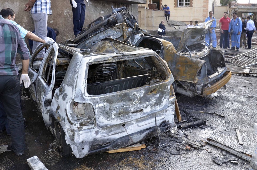 Car bomb kills three at Cairo police HQ: state media