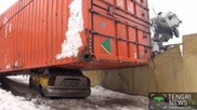 Crane drops 40-ton container on taxi in Almaty