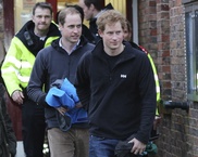 British princes help flood victims as new storm hits